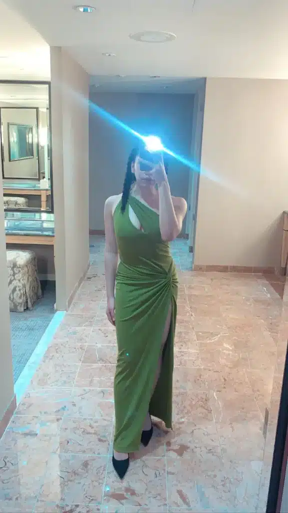 woman in one shoulder green dress from rent the runway