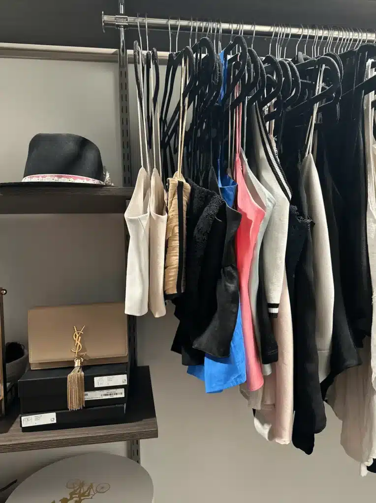 closet with hats and purses