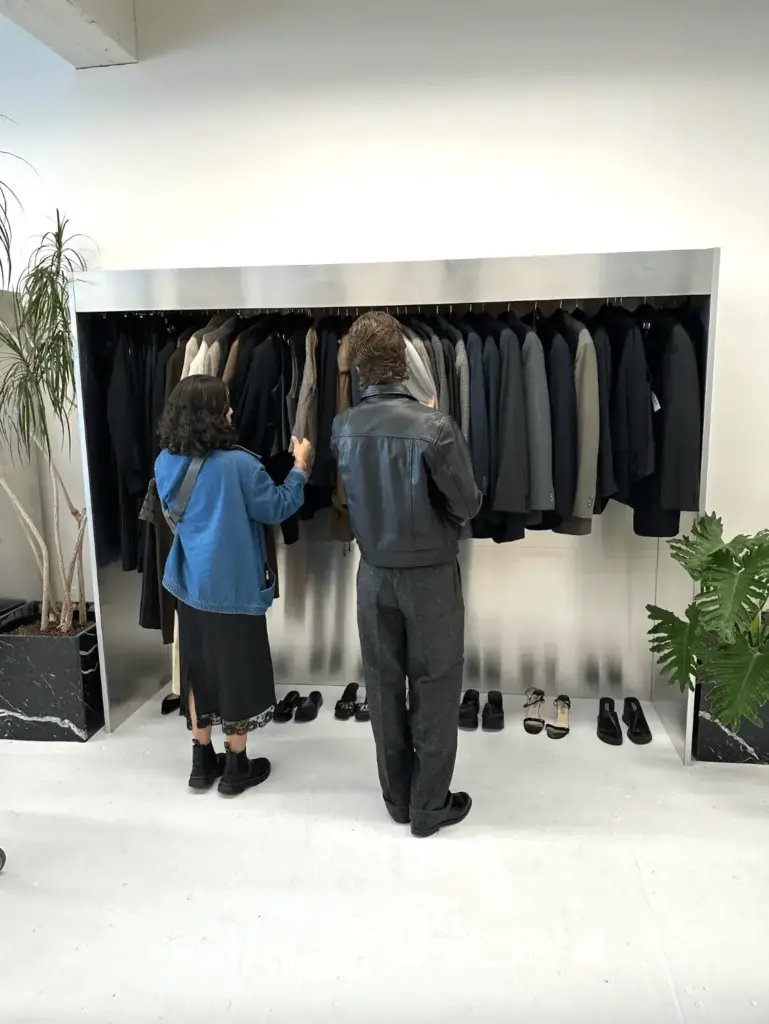 couple shopping in mid-luxury brand clothing store