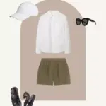 travel wardrobe outfit with linen shorts and baseball cap