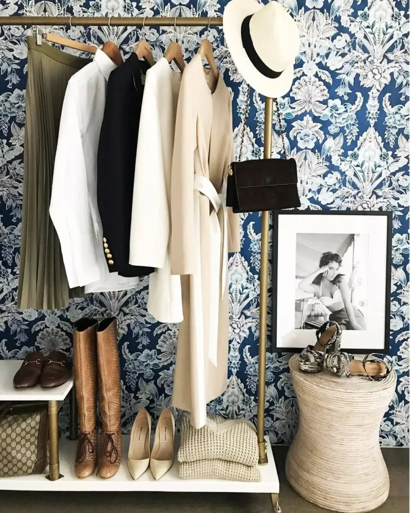 Clothing rack featuring Classic Six pieces including a dress, button down top, and blazer