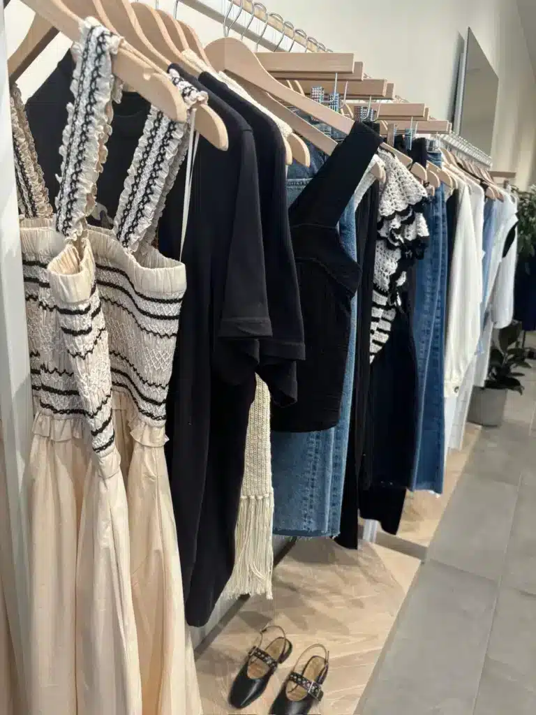 minimalist feminine clothing on rack