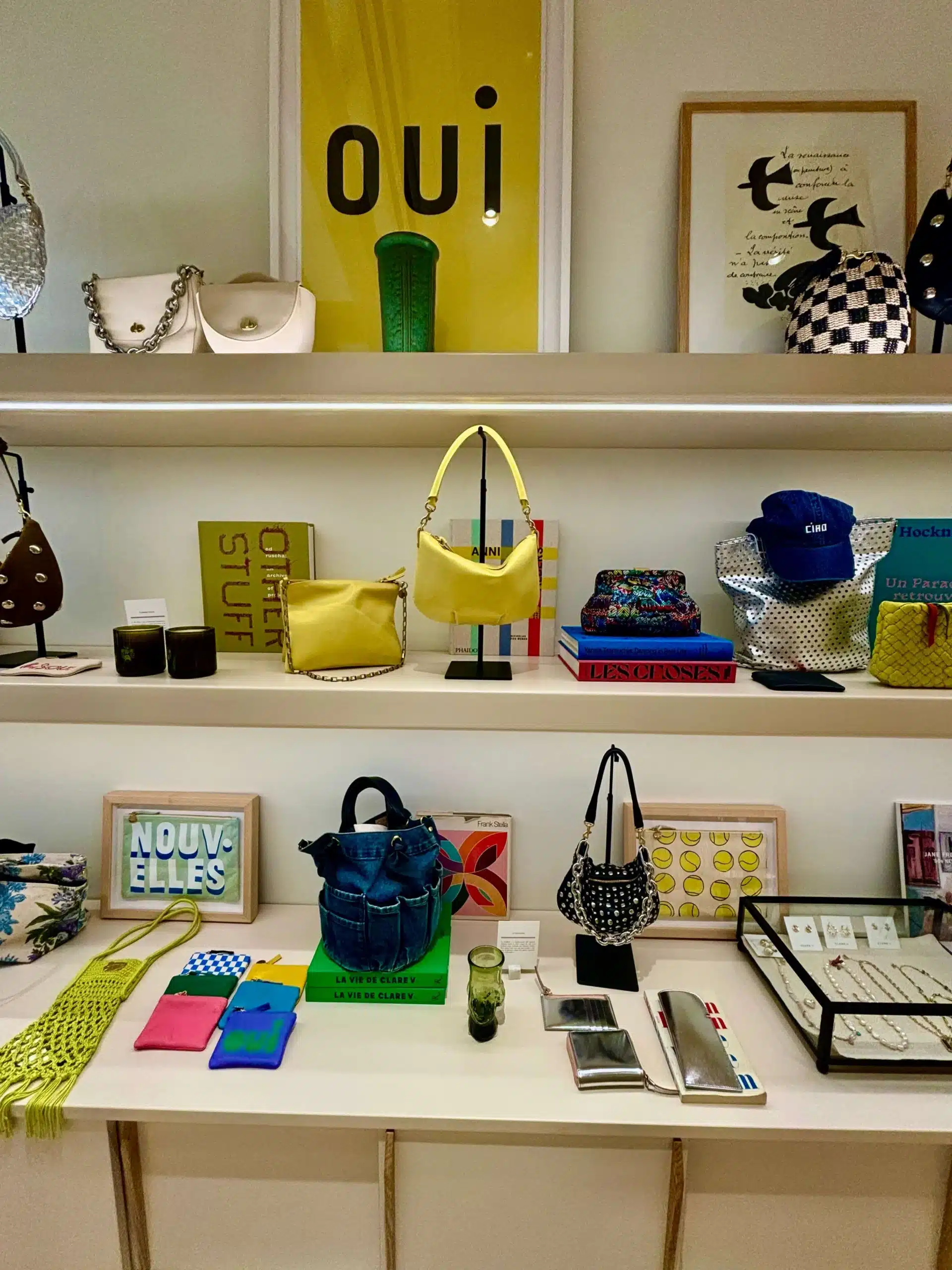 Luxury Handbag display in store with french writing