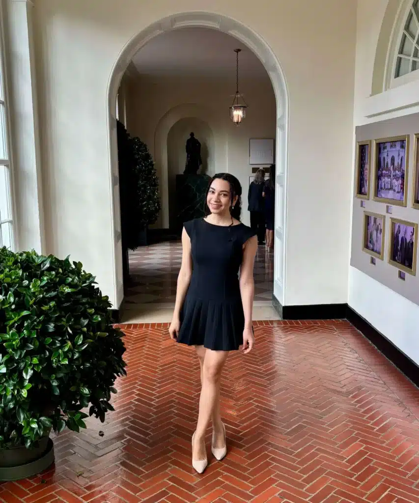 Woman in Aritzia little black dress