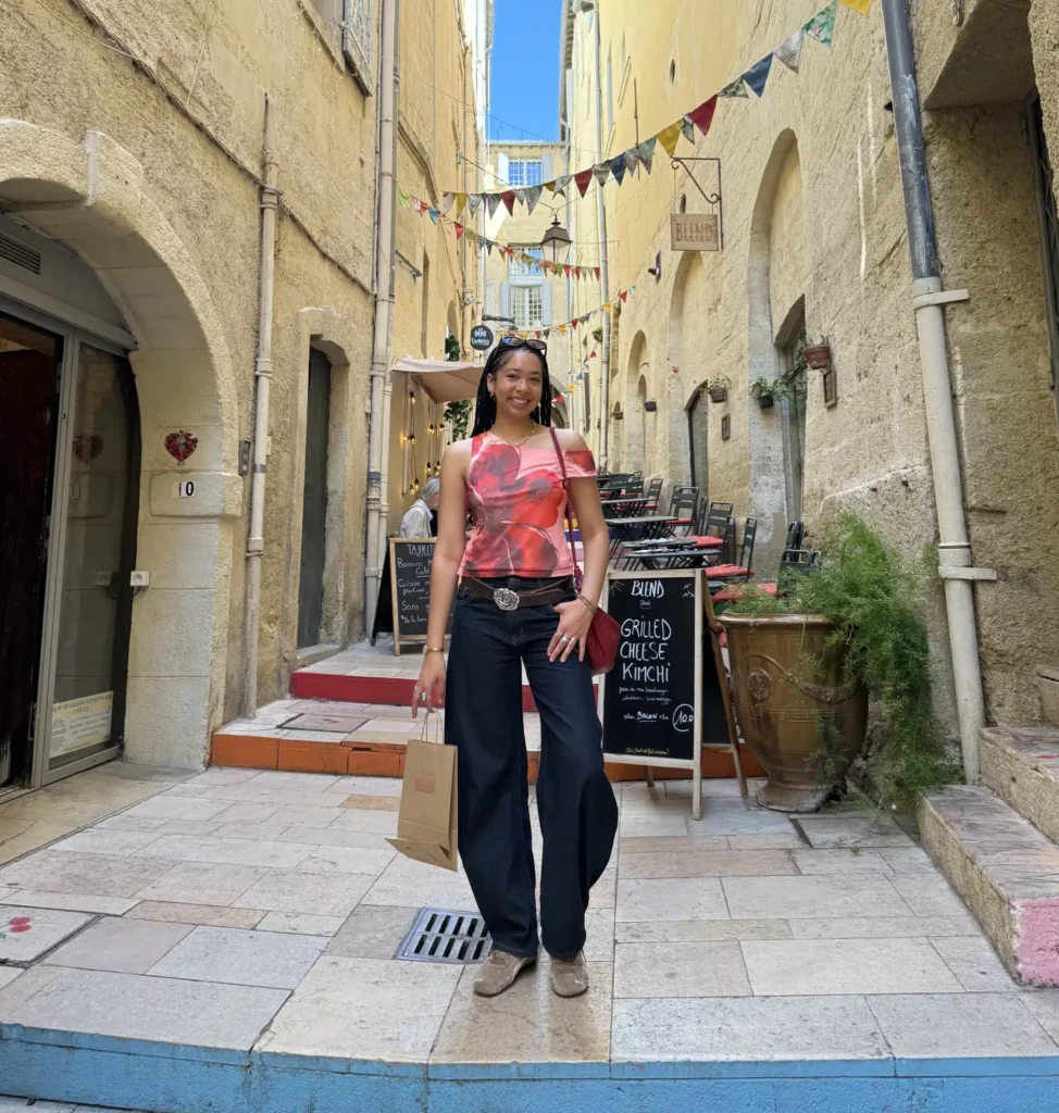nuuly review with woman in pink floral top