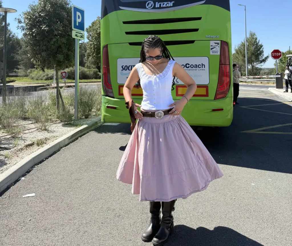 woman in pink skirt rented from nuuly clothing