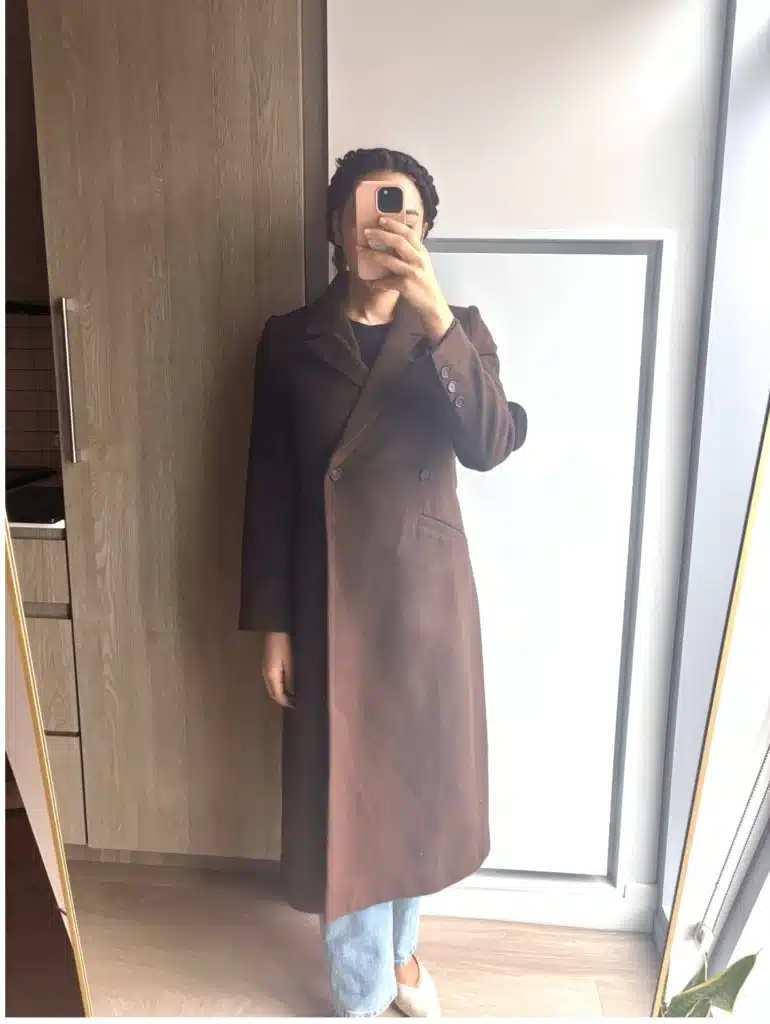 Woman in long brown wool coat
