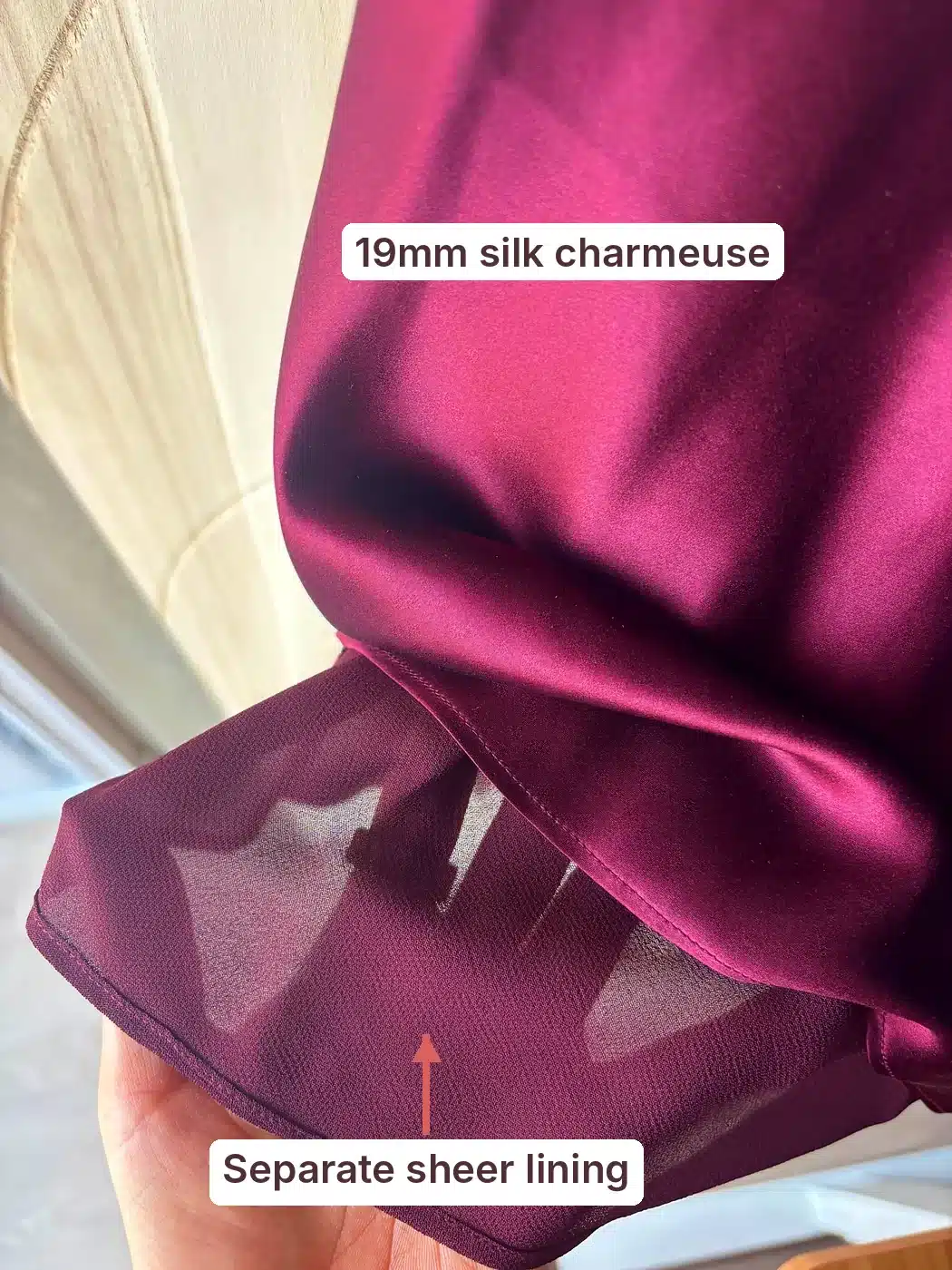Reformation Helen silk dress hem annotated to show the 19mm silk charmeuse and separate sheer lining