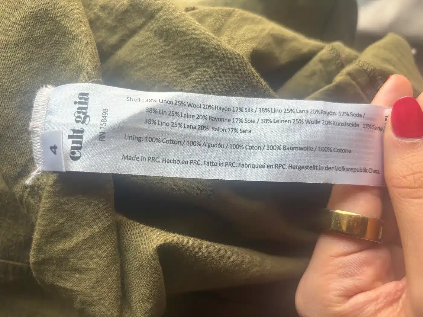 Cult Gaia label listing 38% linen, 25% wool, 20% rayon and 17% silk