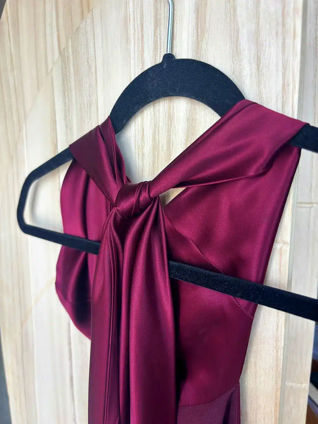 Knotted halter tie on the wine Reformation Helen silk dress