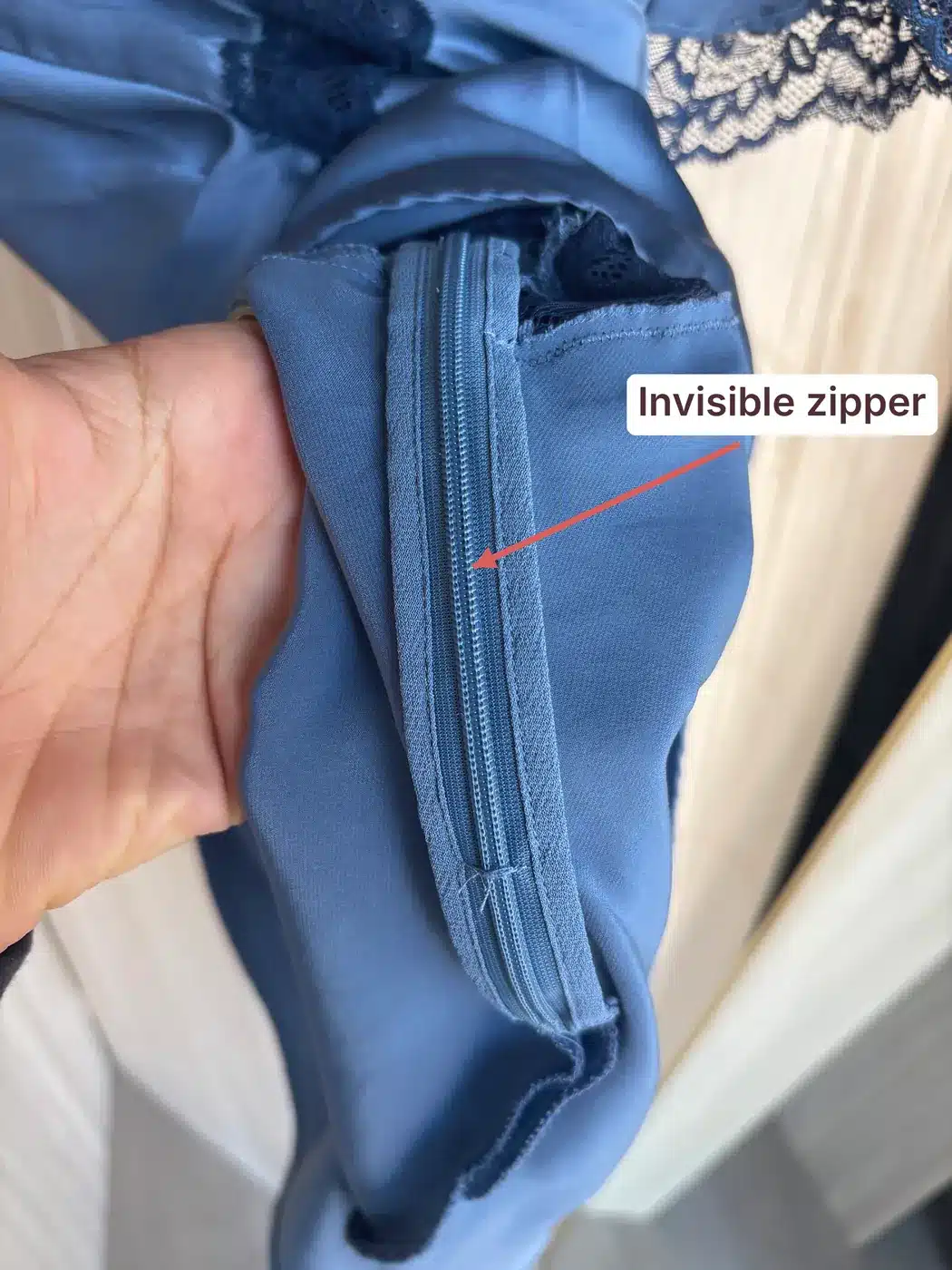 Inside of the Reformation Romi dress showing its invisible side zipper